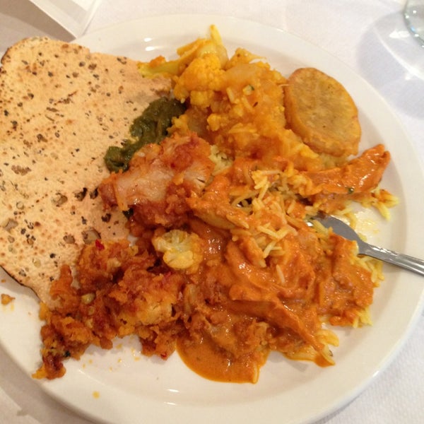 Photo taken at Darbar Indian Cuisine by Angela O. on 8/1/2013