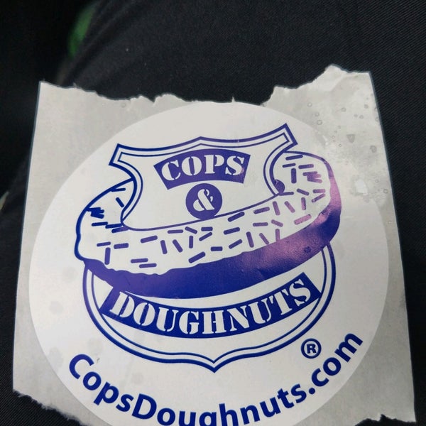 Photo taken at Cops &amp; Doughnuts Bakery by Kaffy on 6/26/2021