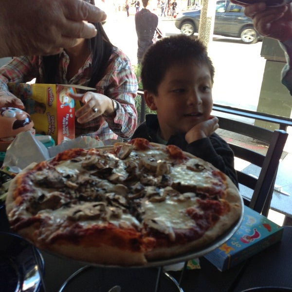 Photo taken at Dino &amp; Santino&#39;s Pizza by Nay T. on 9/18/2013