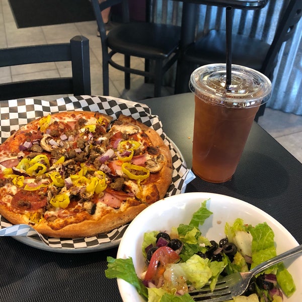 Photo taken at Flying Saucer Pizza by Brent P. on 7/27/2018