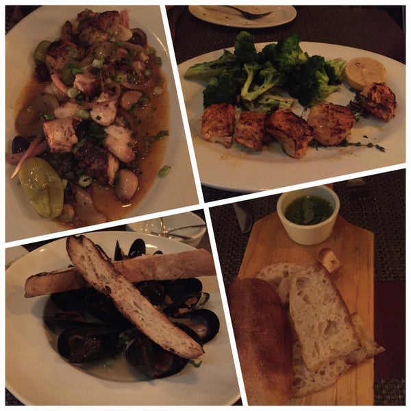 Delicious fresh bread, mussels in white wine, grilled octopus and seafood extravaganza kabob