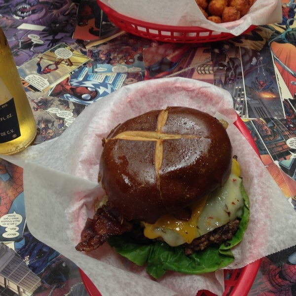 Photo taken at Action Burger by Joanna on 8/2/2014