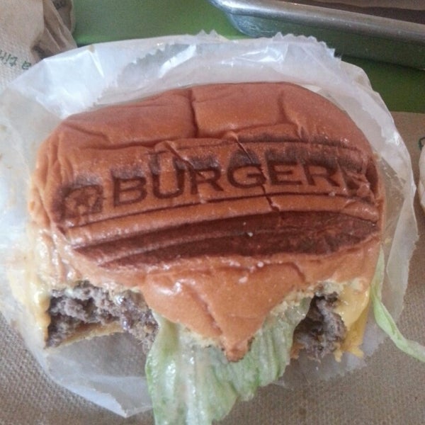 Photo taken at BurgerFi by Jesse P. on 4/18/2014