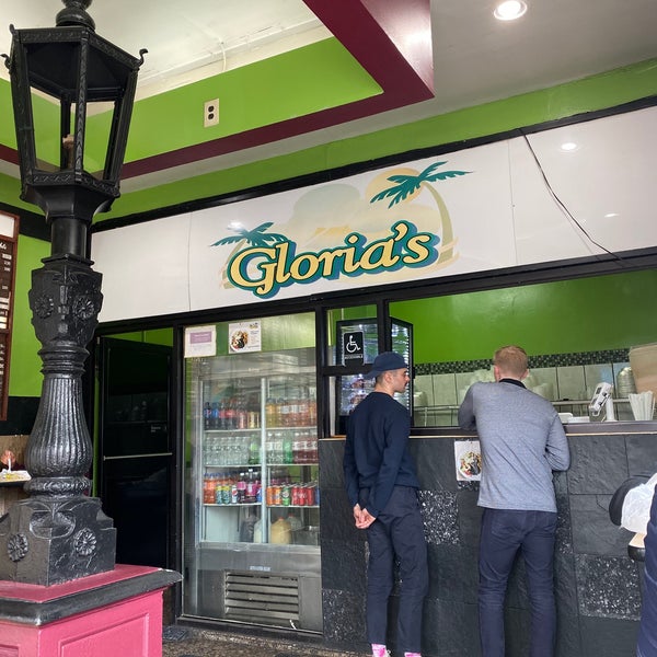 Photo taken at Gloria&#39;s Caribbean Cuisine by Emily W. on 10/12/2019
