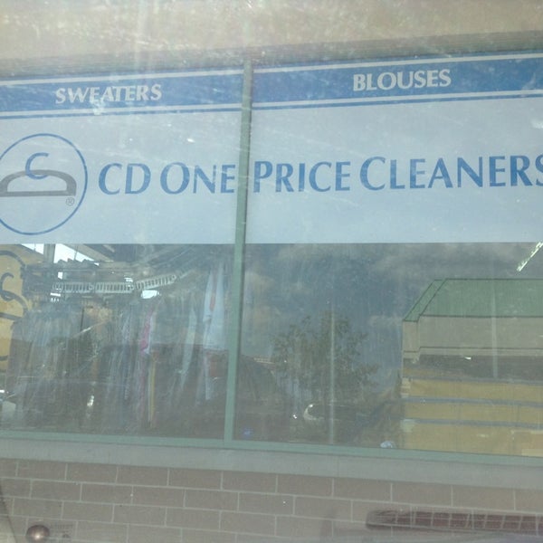 Photo taken at CD One Price Cleaners by Javier C. on 7/19/2013