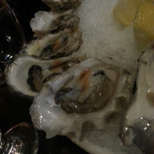 Photo taken at The Embarcadero Wine &amp; Oyster Bar by Elle M. on 2/6/2013