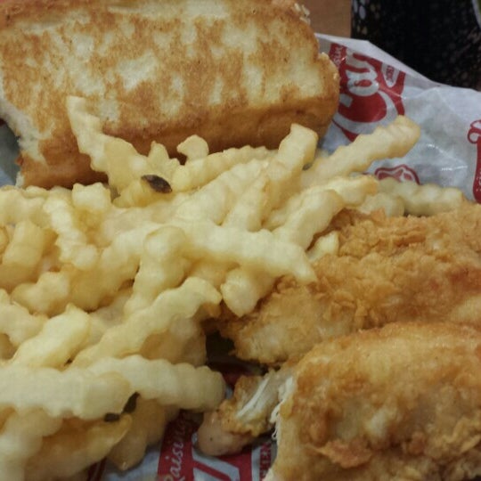 Photo taken at Raising Cane&#39;s Chicken Fingers by Lesley F. on 7/8/2015