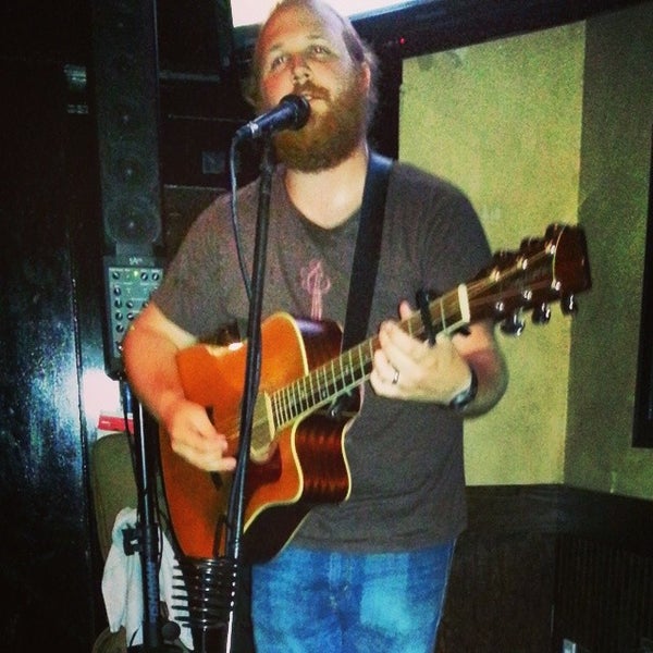Photo taken at Stillhouse Craft Burgers &amp; Moonshine by Gigfind on 8/10/2014