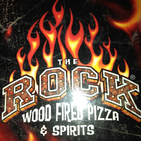 Photo taken at The Rock Wood Fired Pizza by Ray S. on 12/31/2012