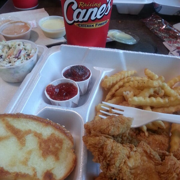 Photo taken at Raising Cane&#39;s Chicken Fingers by Shantalle C. on 6/26/2014