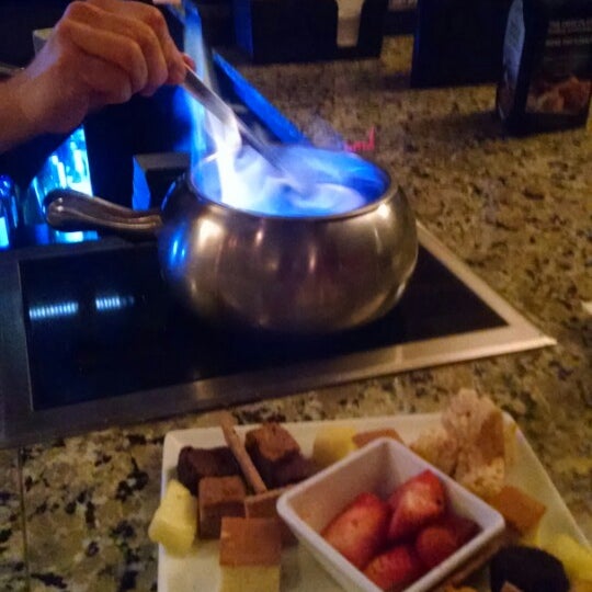 Photo taken at The Melting Pot by Movie L. on 3/27/2015