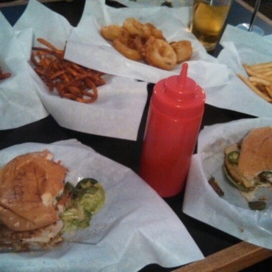 Photo taken at Woody&#39;s Burgers by Movie L. on 4/18/2013
