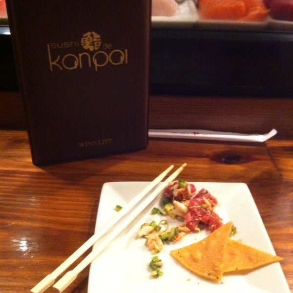 Photo taken at Sushi de Kanpai by Ashley J. on 5/17/2013
