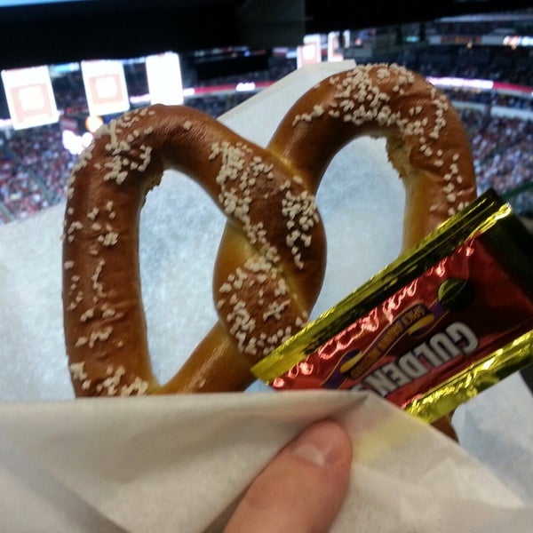 The soft pretzels come out after the first period. Spicy brown mustard is the way to go.