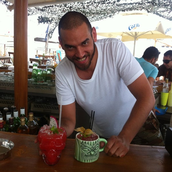 Photo taken at Mylos Beach Bar by Fragolias 🌿🌿 on 7/13/2013