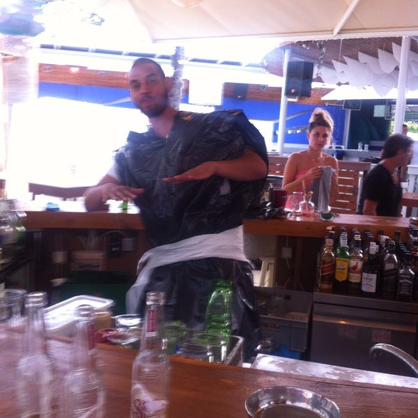Photo taken at Mylos Beach Bar by Fragolias 🌿🌿 on 6/29/2013