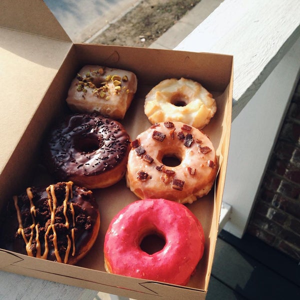 Photo taken at Glazed Gourmet Doughnuts by Joanie on 7/17/2015