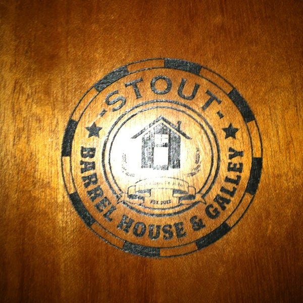 Photo taken at Stout Barrel House and Galley by Rachel on 12/20/2012