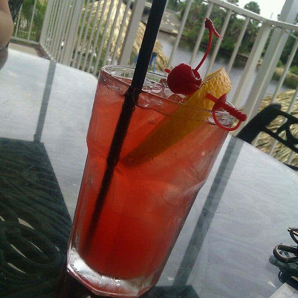 Photo taken at Catches Waterfront Grille by Laura R. on 6/15/2013