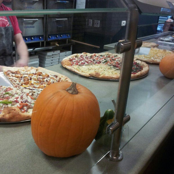 Photo taken at Ian&#39;s Pizza by Aaron R. on 10/13/2012