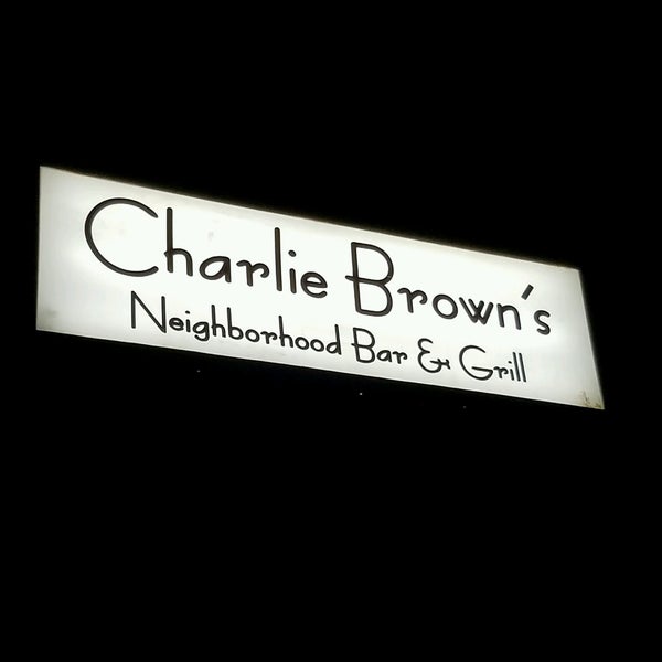 Photo taken at Charlie Brown&#39;s Neighborhood Bar &amp; Grill by Kevin M. on 9/27/2016