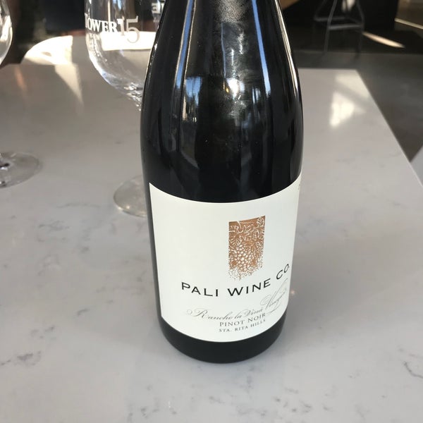 Photo taken at Pali Wine Co. by Piston H. on 7/22/2018