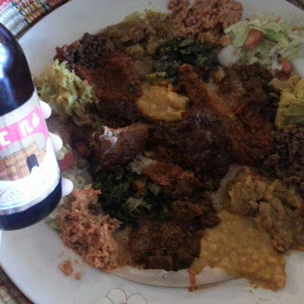 Foto diambil di Messob Ethiopian Restaurant oleh Austin J. pada 2/24/2013