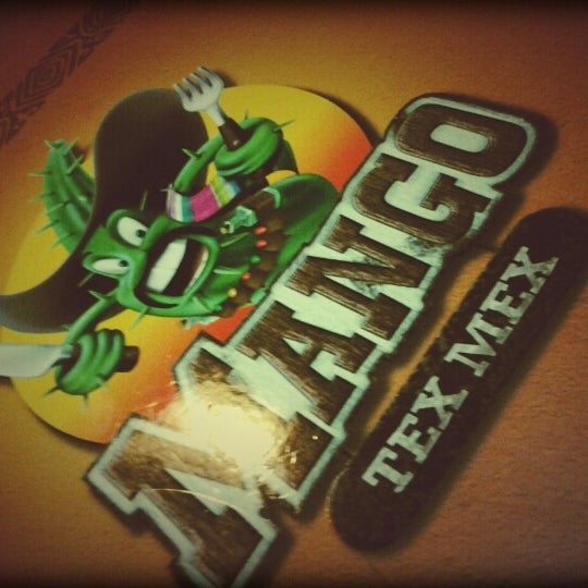 Photo taken at Mango Tex Mex by Alice S. on 12/27/2012
