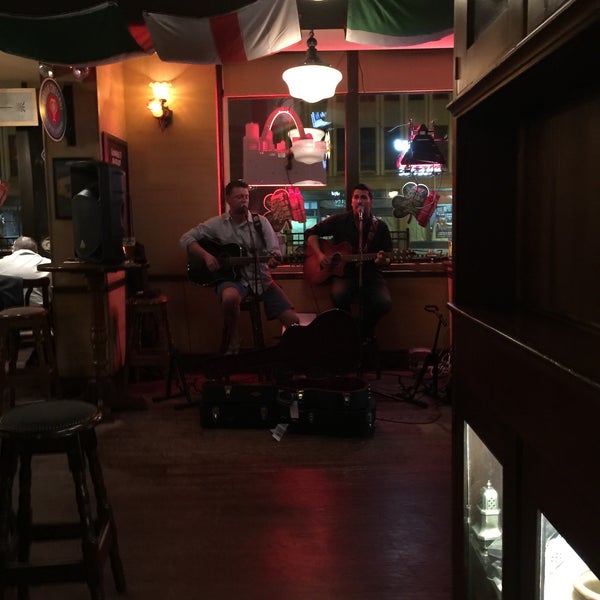Photo taken at Tigin Irish Pub by Brett on 3/13/2015