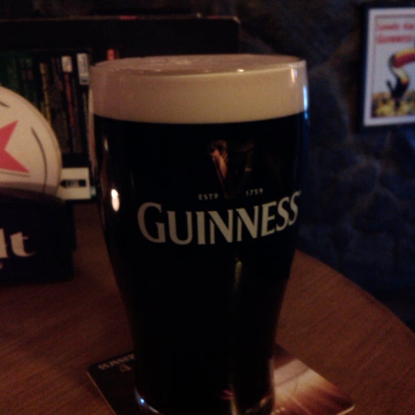 Photo taken at The BLACK STUFF Irish Pub &amp; Whisky Bar by Vera J. on 6/22/2014