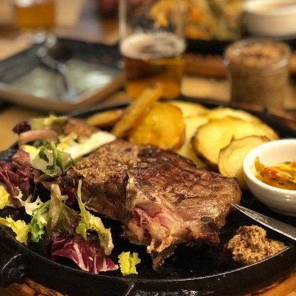 Order your steak, portion size & prep ( medium rare/ medium etc. ) from the butcher. I had a delicious 300g portion of Entrecôte, with potatoes, salad and veg for €21. Tasty, good quality meat.
