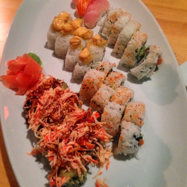 Photo taken at Koko Sushi Bar &amp; Lounge by Julie F. on 4/1/2014