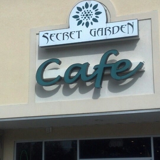 Photo taken at Secret Garden Cafe by Kathy M. on 12/1/2013
