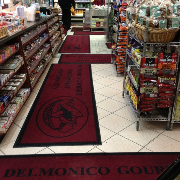 Photo taken at Delmonico Gourmet Food Market by Jean W. on 2/8/2013