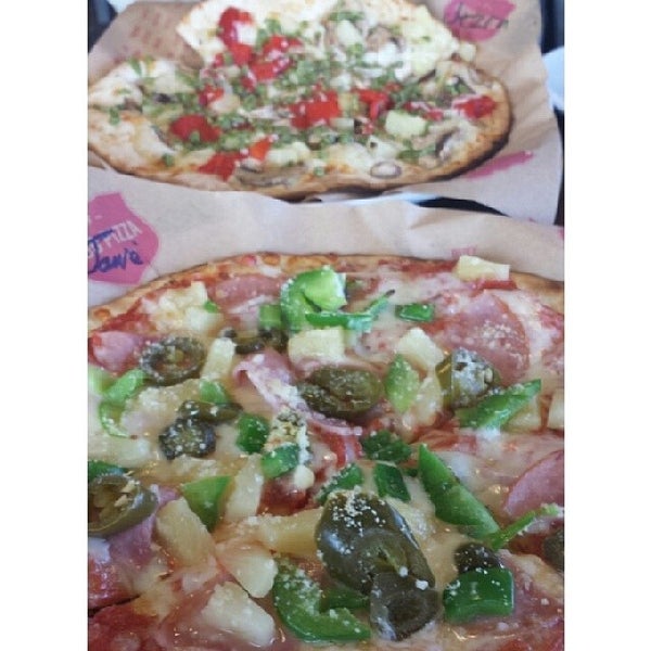 Photo taken at Mod Pizza by Jamie N. on 2/13/2014
