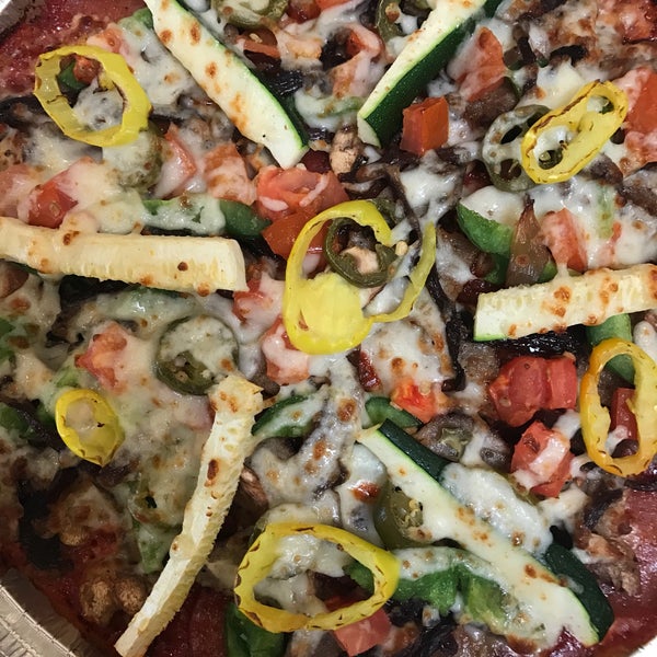 The newest and greatest is their Doughless Pizza.  But all pizzas are custom, fresh and made to order.  The wings are awesome and not fried but grilled.