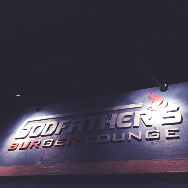 Photo taken at Godfather&#39;s Burger Lounge by Corey P. on 12/15/2014