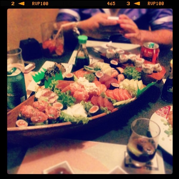 Photo taken at Sushi Garden by Fer on 12/20/2012