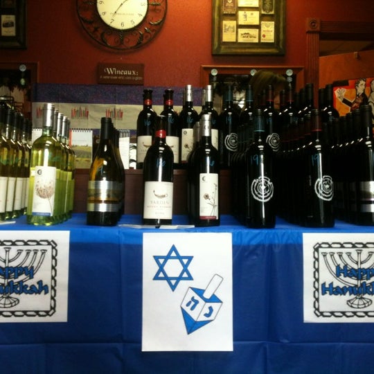 Photo taken at Vinously Speaking - An Eclectic Wine Shop &amp; Blog by Robin E. on 12/8/2012