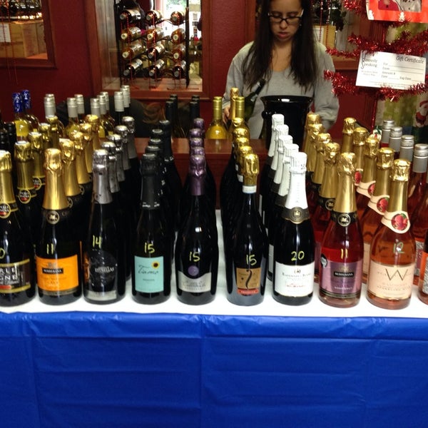 Photo taken at Vinously Speaking - An Eclectic Wine Shop &amp; Blog by Robin E. on 12/28/2013
