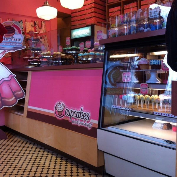 Photo taken at Cupcakes on Denman by Marion on 3/14/2014