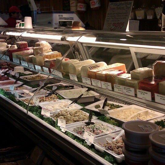 Photo taken at Giuliano&#39;s Delicatessen &amp; Bakery by Mellie O. on 6/14/2013