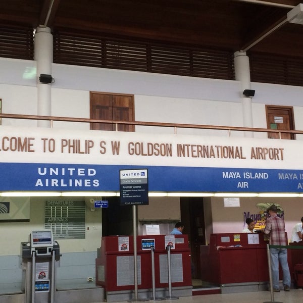 Photo taken at Philip S.W. Goldson International Airport (BZE) by Becky S. on 5/8/2014