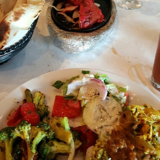 Photo taken at TAVA Contemporary Indian Cuisine by Todd T. on 8/13/2015