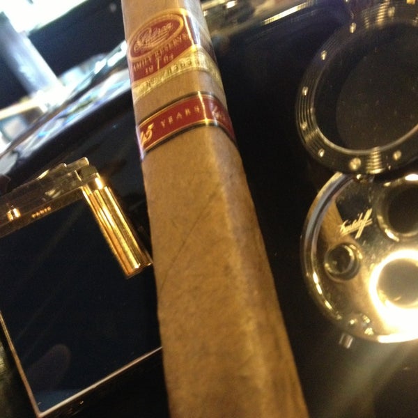 Photo taken at Bayside Cigars by Emre P. on 5/24/2013