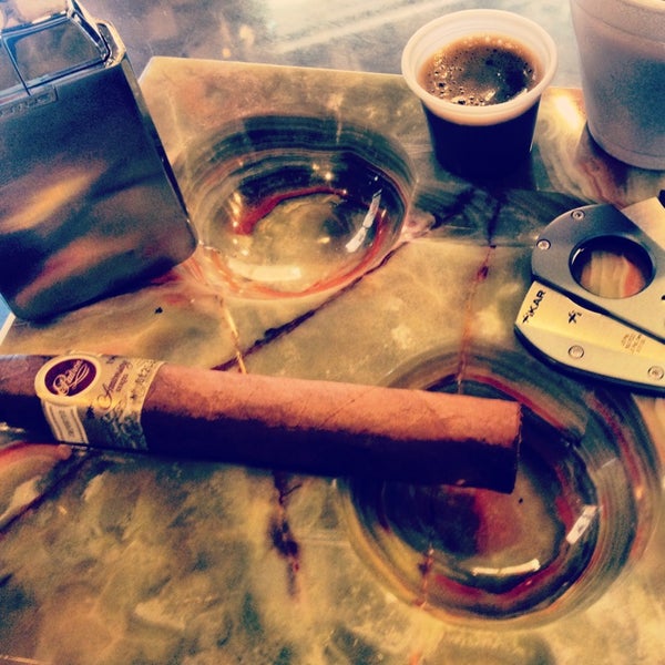 Photo taken at Bayside Cigars by Emre P. on 5/23/2013