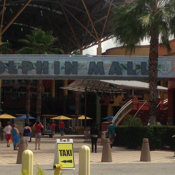 Photo taken at Dolphin Mall by Marcos M. on 4/18/2013
