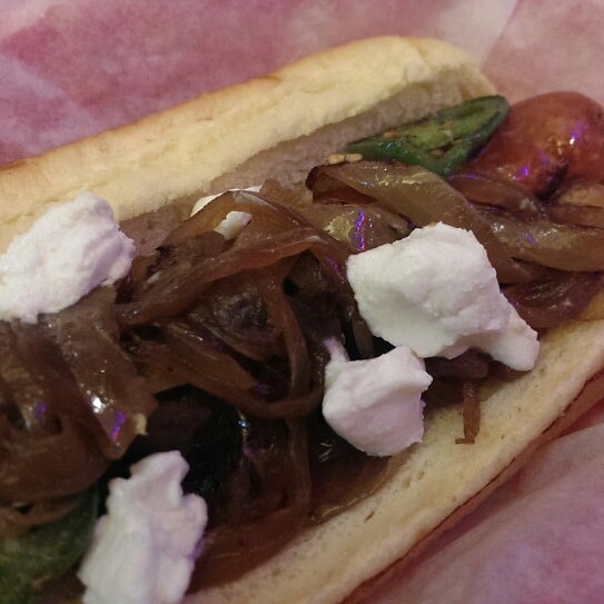 Photo taken at The Slaw Dogs at the Village by Yvette H. on 10/29/2013