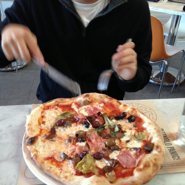 Photo taken at Michael&#39;s Pizzeria by Sarah Y. on 1/11/2013