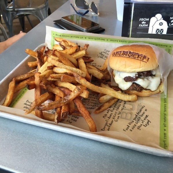 Photo taken at BurgerFi by Hector on 7/29/2016
